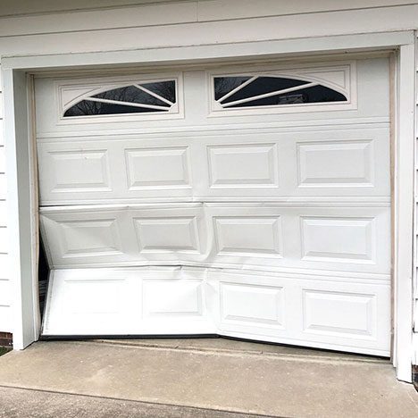 dented garage door panels