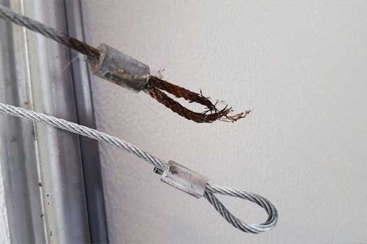 snapped garage door cable